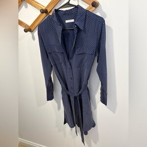 Equipment silk dress in navy with a cream polka dot pattern.